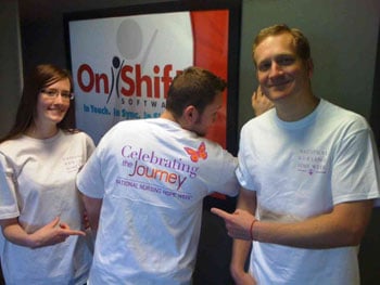 "Celebrating the Journey" t-shirts modeled by OnShift employees 